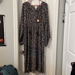 Super cute long sleeve floral dress. Can dress up or keep causal, super comfy